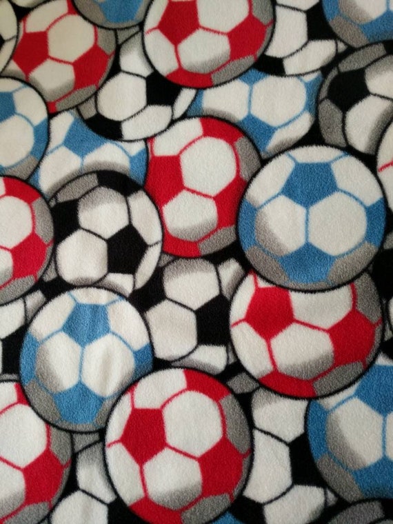 REMNANT-1/2 yard-fleece fabric-soccer balls
