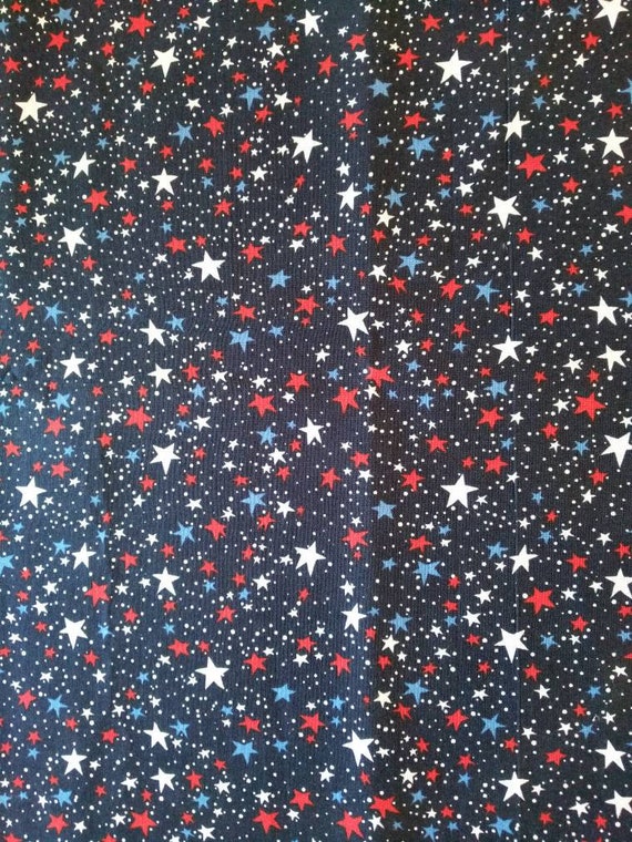 REMNANT-3/8 yard cotton fabric- red, white and blue stars on navy blue background.