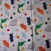 REMNANT-1/2 yard cotton fabric- dinosaurs