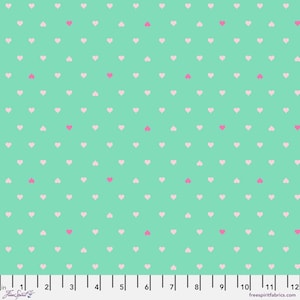 May include: A teal fabric with a repeating pattern of white and pink hearts. The fabric is measured in inches.