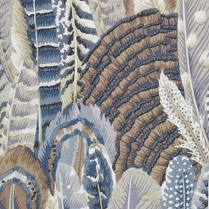 May include: Close-up of a fabric with a repeating pattern of stylized feathers. The feathers are in shades of blue, brown, and gray, creating a textured and layered effect. The design evokes a natural, organic theme.