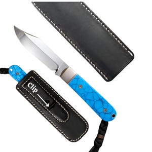 May include: A stainless steel knife with a turquoise handle and a black leather sheath. The knife has a silver blade and a handle with a blue, cracked pattern. The sheath is black with white stitching and the word "Clip" is printed on the sheath.