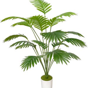 May include: A lush, artificial palm plant with vibrant green fronds. The plant features multiple stems emerging from a white cylindrical pot filled with green moss. The leaves are detailed and create a full, tropical appearance, perfect for home decor.