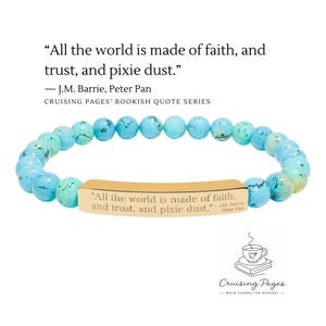 May include: A turquoise beaded bracelet with a gold-colored bar inscribed with a quote from J.M. Barrie's Peter Pan: "All the world is made of faith, and trust, and pixie dust." The bracelet is from the Cruising Pages Bookish Quote Series.