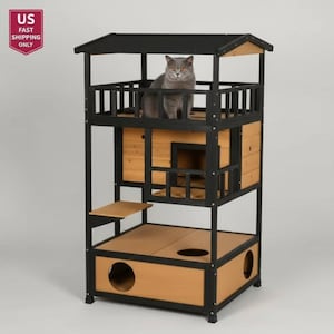 May include: A multi-level cat tree with a gray cat. The cat tree has a black frame with natural wood accents. It features a top level with a roof, a middle level with a cat house, and a bottom level with two circular openings. The cat is sitting on the second level.