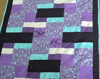 Homemade baby quilt, Purple and Teal, Birds and Bees. Patchwork pattern.