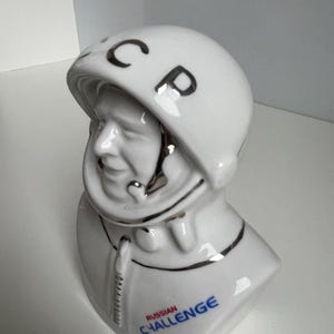 Three-quarter view of vintage USSR cosmonaut bust in glazed white porcelain, Verbilki factory