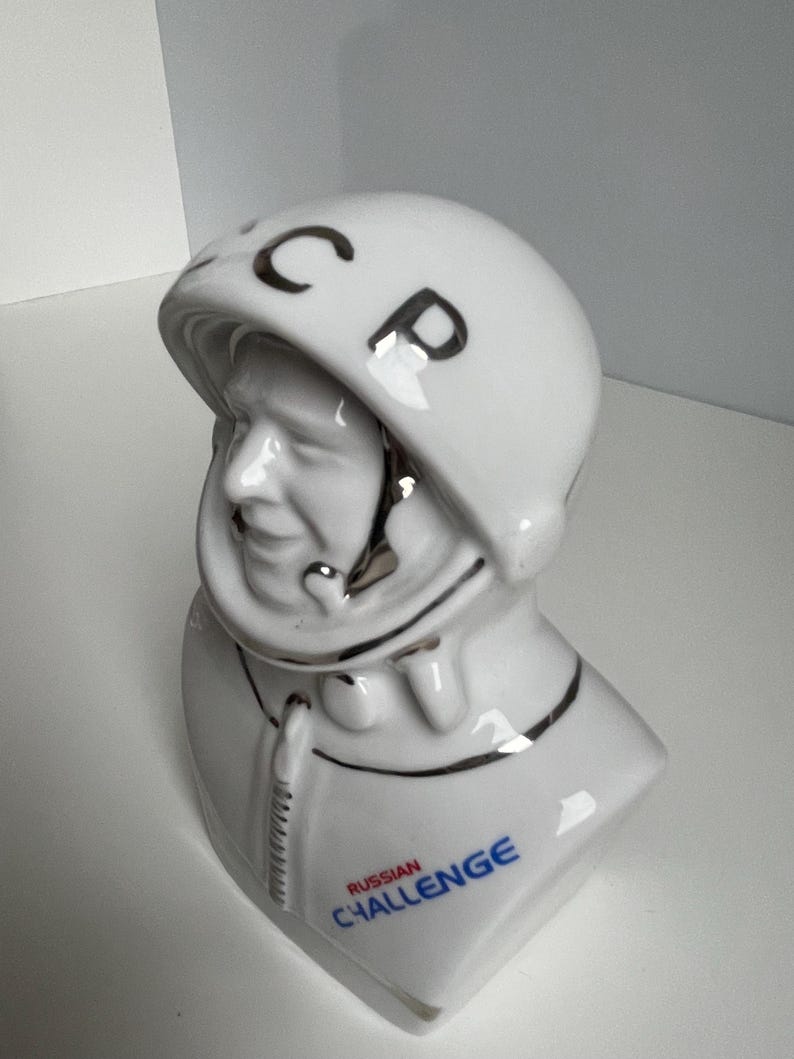 Three-quarter view of vintage USSR cosmonaut bust in glazed white porcelain, Verbilki factory