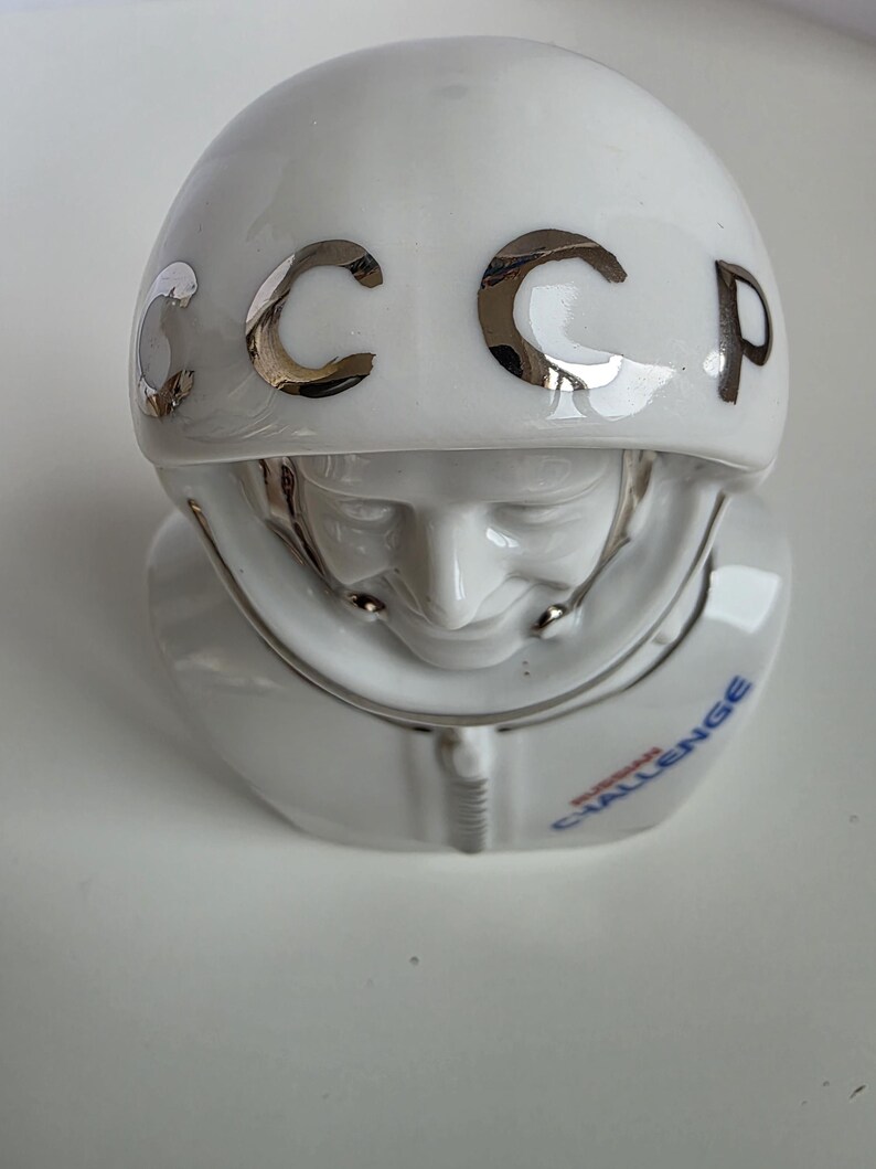 Top view showing USSR lettering on helmet of vintage Soviet cosmonaut porcelain bust