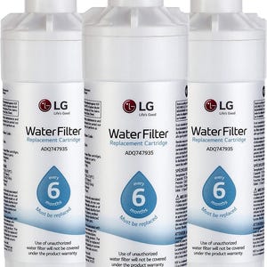 May include: Three white LG water filter replacement cartridges. Each cartridge has the LG logo, the words "Water Filter Replacement Cartridge", and the model number ADQ747935. The cartridges indicate they should be replaced every 6 months.