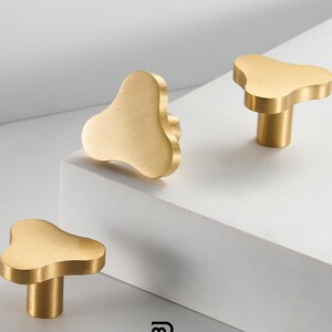 Massief messing klavertje kastknoppen, driebladige ladegrepen, moderne architectonische handgrepen