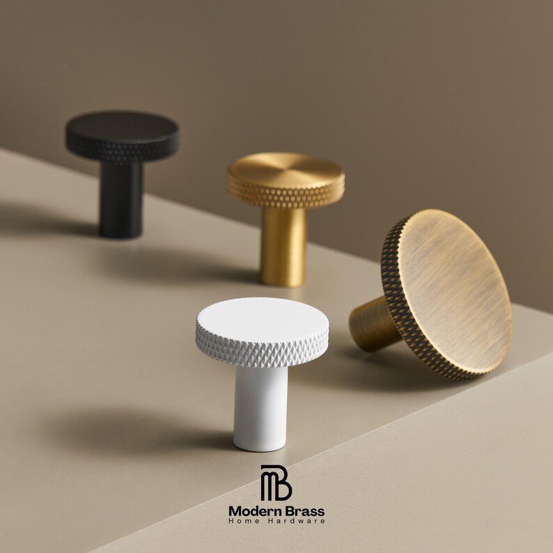 Solid brass knurled knobs and pulls for luxury cabinetry and furniture restoration.