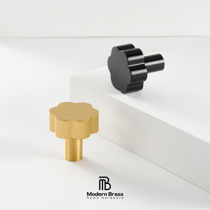 Traditional bamboo-style gold handles with decorative node accents and tiered architectural bases.