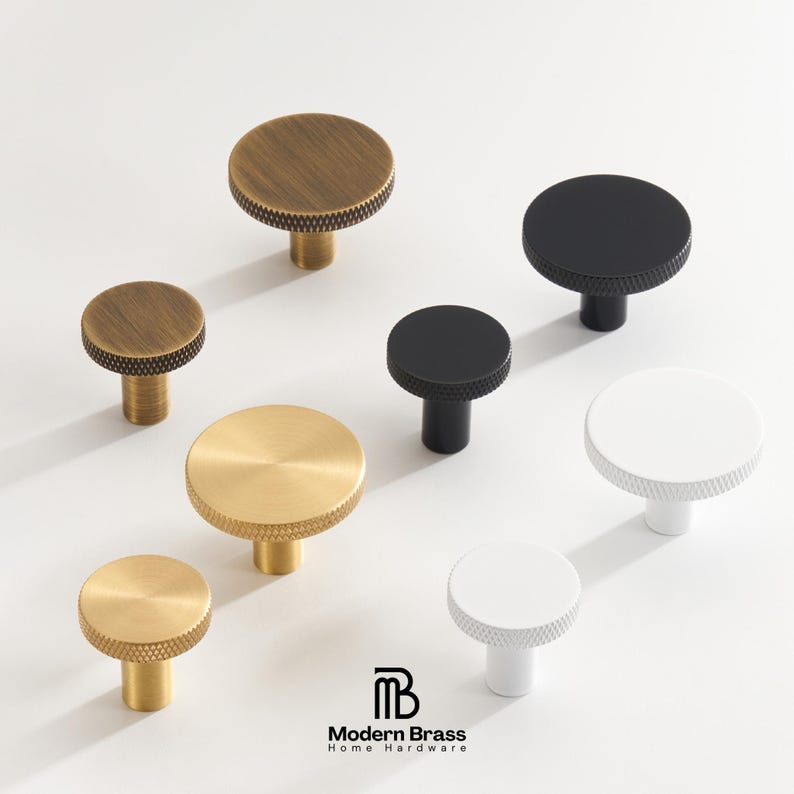 Playful flower-shaped cabinet knobs available in brushed gold, matte black, and antique brass.