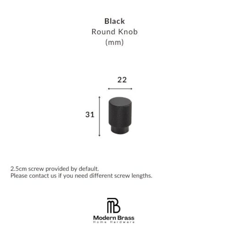 Architectural black hardware set including long appliance pulls and small drawer knobs.