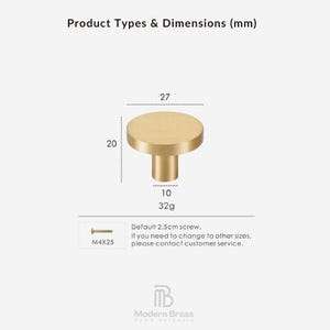 Close-up of solid brass gold drawer knobs showing a smooth satin finish and premium metal construction.