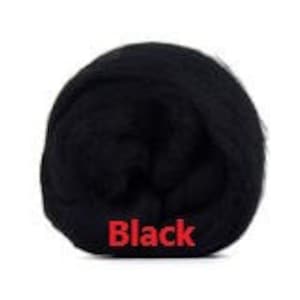 May include: A tightly wound ball of black yarn. The word "Black" is printed in red at the bottom of the image. The yarn appears soft and fluffy, suitable for knitting or crocheting projects.