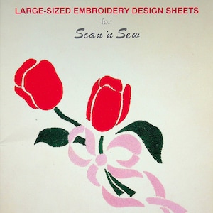 May include: Large-sized embroidery design sheets for Scan 'n Sew, featuring a bouquet of two red tulips with green leaves and a pink ribbon bow.