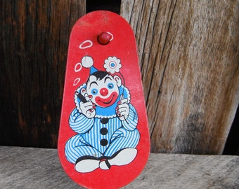 Vintage Tin Litho Noisemaker - Creepy Clown Smoking a Cigar