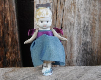 Antique Little Bisque Frozen Penny Doll - Little Dress and Petticoat