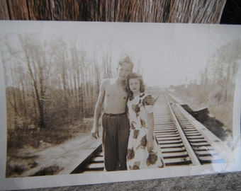 Vintage Snapshot Photo - Young Romantic Couple on Train Tracks