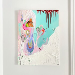 May include: Abstract painting with a pink, blue and white background. The painting features a variety of shapes and colours, including a large pink shape in the centre. The painting is signed "ABN" in the bottom right corner.