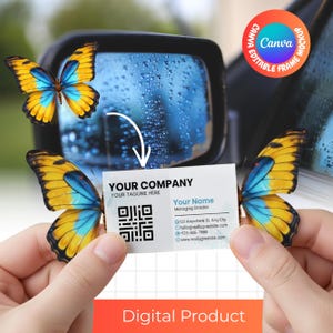 May include: A business card mockup with butterfly wings, featuring the text "YOUR COMPANY" and contact information. The card is held in front of a car mirror with a Canva editable frame and the words "Digital Product".