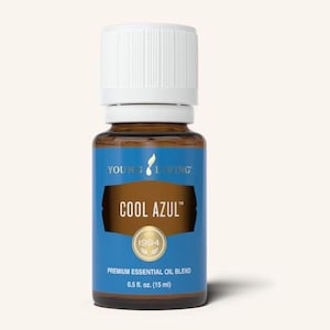 May include: A brown glass bottle of Young Living Cool Azul premium essential oil blend. The blue label features the text "COOL AZUL" and "1994". The bottle contains 0.5 fl. oz. (15 ml) of oil and has a white cap.