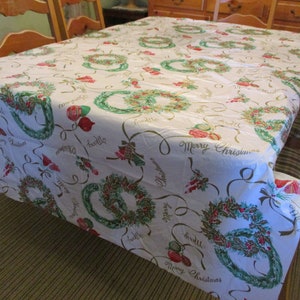 Vintage Plastic  Vinyl Tablecloth Merry Christmas in Cursive Wreaths Holly Berries Shiny Brites Bells Gold No Backing 54 x 86 1 Sm Slit EVC