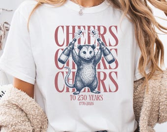 Poppin' Bottles Possum Shirt, Cheers To 250 Years, Comfort Colors 1717, USA 250th Anniversary, Feralcore Gift, Chaotic 4th Of July Tee