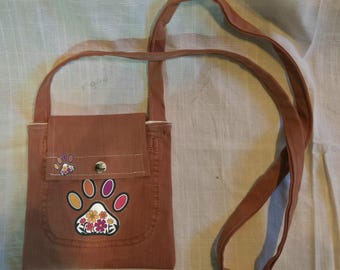 Homemade upcycled denim purse with paw prints