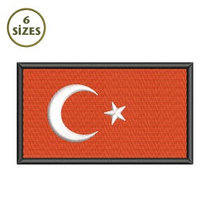 May include: Embroidered patch featuring the Turkish flag. The flag has a red background with a white crescent moon and star. The patch is rectangular with a black border and the text "6 SIZES" in a circle.