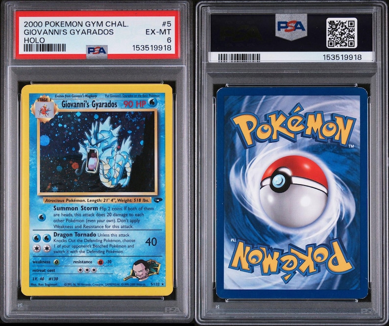 May include: A graded Pok&eacute;mon card featuring Giovanni's Gyarados. The card has a blue and yellow design with a holographic image of a blue dragon-like creature. The card is encased in a protective plastic case with a PSA grade of 6.