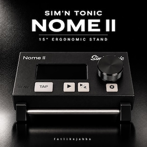 May include: A black Sim'n Tonic Nome II 15° ergonomic stand featuring a digital display, a circular dial, and four rectangular buttons labeled SYNC, TAP, play, and settings. The device is mounted on a silver horizontal bar with black supports.