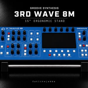 May include: A blue Groove Synthesis 3rd Wave 8M synthesizer module mounted on a black 15-degree ergonomic stand. The device features a central black screen, numerous black rotary knobs, and white and red square buttons with printed labels.