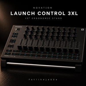 May include: A black Novation Launch Control 3XL with a 15-inch ergonomic stand. The device has multiple knobs, faders, and buttons. The text "LAUNCH CONTROL 3XL" is visible, along with the brand name "Novation".