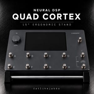 May include: A dark gray Neural DSP Quad Cortex floor processor mounted on a 15-degree ergonomic stand. The device features a central display screen, a large volume knob, and eight metallic footswitches labeled A through H, with additional controls.