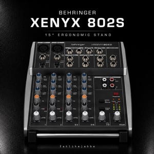 Könnte beinhalten: Ein schwarzes Behringer XENYX 802S Audiomischpult mit mehreren Eingangskanälen, silbernen Drehreglern, orangefarbenen und weißen Pegelreglern sowie einem ergonomischen 15-Grad-Ständer. Der Markenname und das Modell stehen in weißem Text oben.