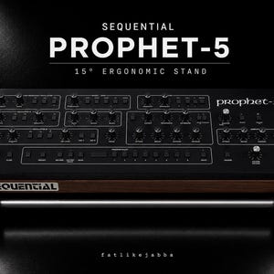 May include: A black Sequential Prophet-5 synthesiser mounted on a 15-degree ergonomic stand. The unit features a dark wood frame, numerous control knobs, and switches. The text reads: SEQUENTIAL PROPHET-5 15° ERGONOMIC STAND and SEQUENTIAL.