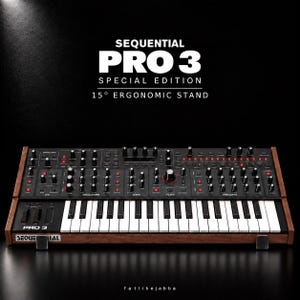 May include: A Sequential Pro 3 Special Edition synthesiser featuring a black control panel with numerous knobs, buttons, and a keyboard. The unit is mounted on a 15-degree ergonomic stand and framed by dark wood side panels with white text.