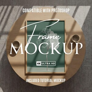 May include: A framed art mockup with a green background and a white tree design. The frame is on a light wood table with two small, round containers. Text on the image includes "Frame Mockup", "4K Ultra HD", and "Compatible with Photoshop".