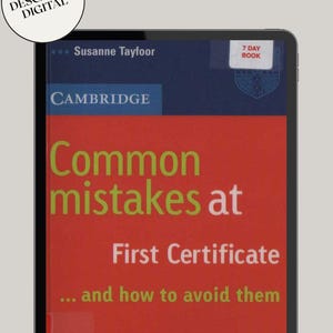May include: A digital tablet showing a book cover. The book, by Susanne Tayfoor, is titled "Common Mistakes at First Certificate... and how to avoid them." The cover is red with green and white text and published by Cambridge.