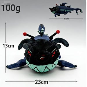 May include: A plush toy creature with a black head, red accents, and a teal mouth. The toy is approximately 9 inches long, 5 inches tall, and 15 inches wide. A smaller version of the toy is also shown. The toy weighs 100g.