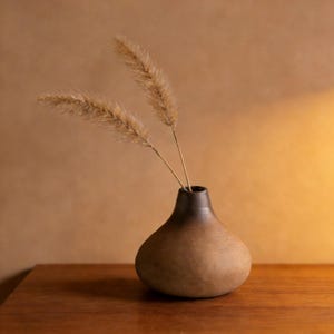 May include: A distressed wooden sign, inscribed with 'Welcome to our home' in white. The sign has a rustic appearance, ideal for adding a welcoming touch to any home's entrance.