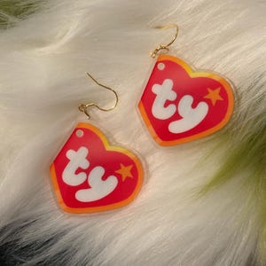 plushy heart tag furry earrings