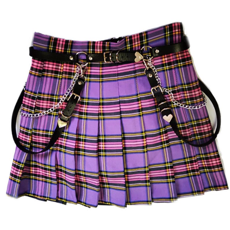 Pleated Mini Skirt | Casual Ruffle Plaid Fashion | Streetwear Grunge Outfit

Woman wearing a layered pleated mini skirt with plaid design and ruffle details, styled in a grunge Y2K streetwear outfit.