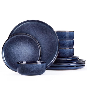 May include: A complete dinnerware set featuring a deep blue speckled glaze. The set includes various sized plates and bowls, with a dark rim. The plates are stacked, and the bowls are in a neat pile, all against a white background.