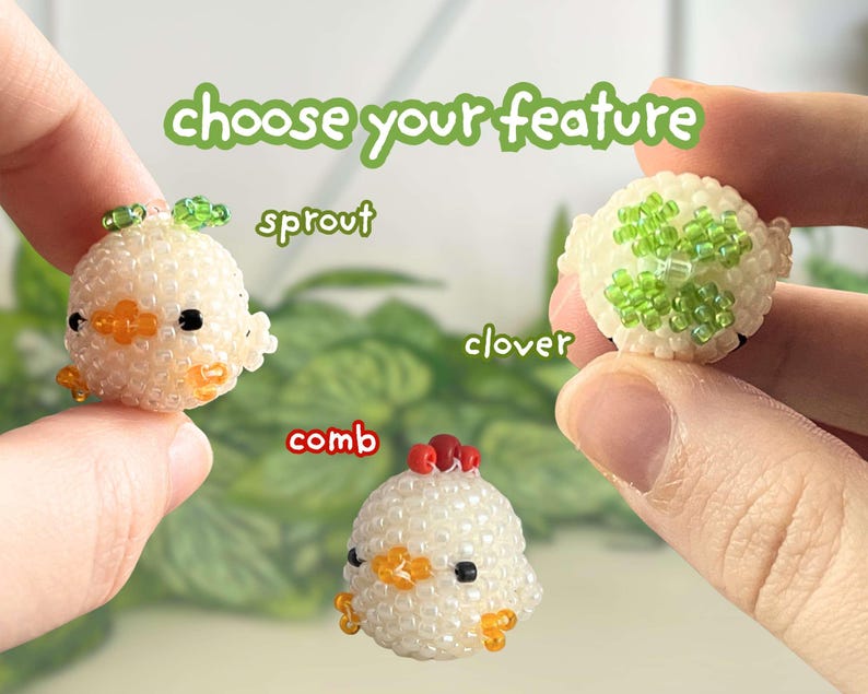 May include: Three small, round, beaded figures made of white seed beads. The text "choose your feature" appears at the top. Labels indicate "sprout" for the figure with a green top, "clover" for the one with green beads, and "comb" for the red-topped one.