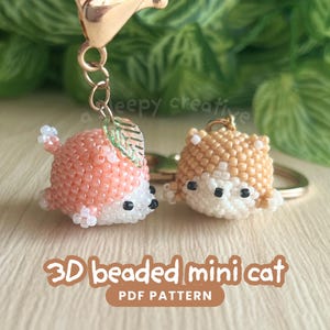 May include: A white ceramic mug with a black handle and the text "But First, Coffee" in a black, bold font. The mug is on a white surface. The mug is approximately 4 inches tall.