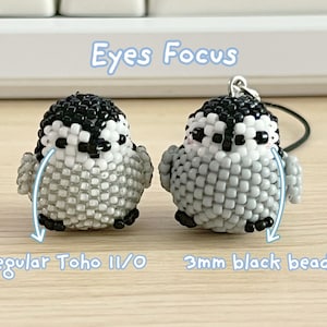 May include: Two small bird figurines crafted from beads, featuring black, white, and grey patterns. The text "Eyes Focus" appears above, with arrows pointing to "regular Toho 11/0" and "3mm black beads" labels indicating the specific bead types used.